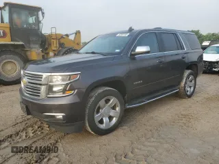 2015 Chevrolet Tahoe LTZ z VIN 1GNSCCKC5FR593682, wystawiony jako Copart lot #52084105 z przebiegiem 160 447 mil mil oraz Czysty tytuł • Clean title. Historia ofert i sprzedaży dostępna na DreamBid. Obrazek 1.