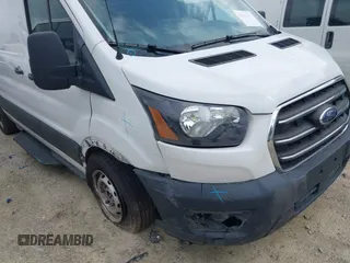 2020 Ford Transit Cargo with VIN 1FTBR1Y85LKA70004, listed as a IAAI auction lot 41910007 with 115,005 mi miles and . Bid and sale history available at DreamBid. Image 6.