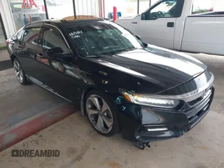 2018 Honda Accord Touring with VIN 1HGCV1F95JA149043, listed as a IAAI auction lot 42707815 with 131,132 mi miles and . Bid and sale history available at DreamBid. Image 1.