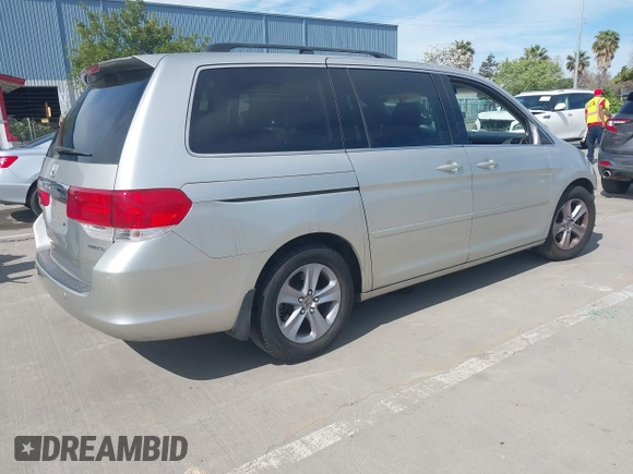 2009 Honda Odyssey Touring с VIN 5FNRL38969B013708, выставлен на аукционе IAAI как лот 42002538 с пробегом 198 220 миль миль и . История ставок и продаж доступна на DreamBid. Изображение 4.