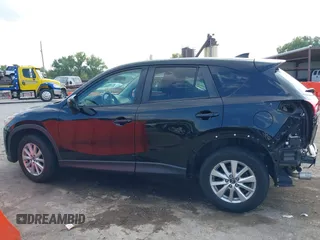 2016 Mazda CX-5 Touring with VIN JM3KE2CY5G0653108, listed as a IAAI auction lot 37717249 with 90,704 mi miles and . Bid and sale history available at DreamBid. Image 15.