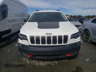 2021 Jeep Cherokee Trailhawk with VIN 1C4PJMBX4MD138927, listed as a Copart auction lot 51919555 with 92,759 mi miles and Salvage title. Bid and sale history available at DreamBid. Image 5.