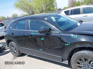 2021 Mazda CX-30 S with VIN 3MVDMBAL6MM302498, listed as a IAAI auction lot 42012356 with 50,477 mi miles and . Bid and sale history available at DreamBid. Image 14.