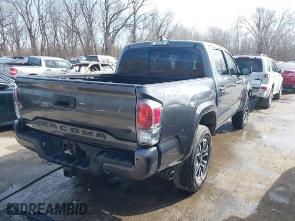 2021 Toyota Tacoma SR z VIN 3TMCZ5AN0MM392247, wystawiony jako IAAI lot #41645989 z przebiegiem 48 029 mil mil oraz . Historia ofert i sprzedaży dostępna na DreamBid. Obrazek 4.