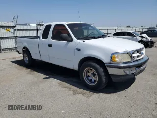 1997 Ford F-150 с VIN 1FTDX1769VNC17277, выставлен на аукционе Copart как лот 59754995 с пробегом 190 116 миль миль и Списание • Salvage title. История ставок и продаж доступна на DreamBid. Изображение 4.