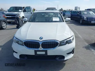 2019 BMW 3 Series 330i with VIN WBA5R1C55KAK12332, listed as a IAAI auction lot 41692035 with 13,657 mi miles and . Bid and sale history available at DreamBid. Image 12.