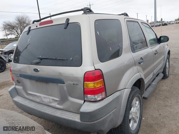 2001 Ford Escape XLT with VIN 1FMYU03141KB51890, listed as a IAAI auction lot 41621695 with 161,930 mi miles. Bid and sale history available at carsss.com. Image 4.