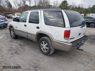 2001 Oldsmobile Bravada with VIN 1GHDT13W512122383, listed as a IAAI auction lot 41624026 with 176,973 mi miles. Bid and sale history available at carsss.com. Image 3.