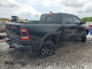 2020 Ram 1500 Rebel with VIN 1C6SRFLT5LN408810, listed as a Copart auction lot 56894725 with 49,089 mi miles and Salvage title. Bid and sale history available at DreamBid. Image 3.