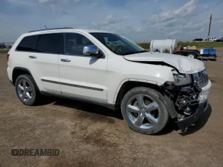 2011 Jeep Grand Cherokee Overland with VIN 1J4RR6GG3BC718723, listed as a Copart auction lot 64975275 with 272,922 mi miles and Salvage title. Bid and sale history available at DreamBid. Image 4.