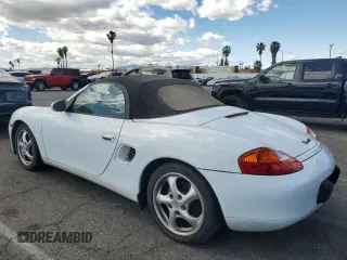 1999 Porsche Boxster z VIN WP0CA2984XU629987, wystawiony jako Copart lot #51366845 z przebiegiem Nie podano mil oraz Czysty tytuł • Clean title. Historia ofert i sprzedaży dostępna na DreamBid. Obrazek 2.