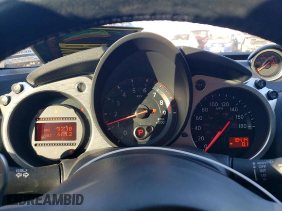 2014 Nissan 370Z Nismo z VIN JN1AZ4EHXEM632166, wystawiony jako Copart lot #88311915 z przebiegiem 18 414 mil mil oraz Szkoda całkowita • Salvage title. Historia ofert i sprzedaży dostępna na DreamBid. Obrazek 9.