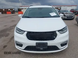 2022 Chrysler Pacifica Touring L with VIN 2C4RC1BG5NR170186, listed as a IAAI auction lot 41422057 with 71,204 mi miles and . Bid and sale history available at DreamBid. Image 12.