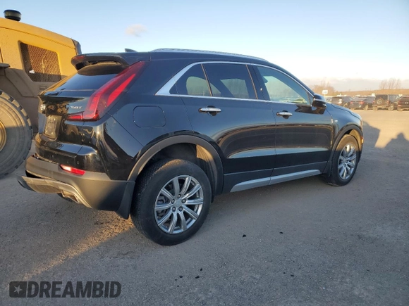 2022 Cadillac XT4 AWD Premium Luxury with VIN 1GYFZDR45NF109999, listed as a Copart auction lot 84618914 with 66,697 mi miles and Clean title. Bid and sale history available at DreamBid. Image 3.