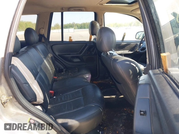 2002 Jeep Grand Cherokee with VIN 1J8GW48N72C207838, listed as a IAAI auction lot 42020294 with 181,283 mi miles and . Bid and sale history available at DreamBid. Image 8.