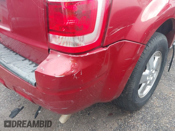 2011 Ford Escape XLT with VIN 1FMCU9D70BKC38169, listed as a IAAI auction lot 42802876 with 233,249 mi miles and . Bid and sale history available at DreamBid. Image 12.