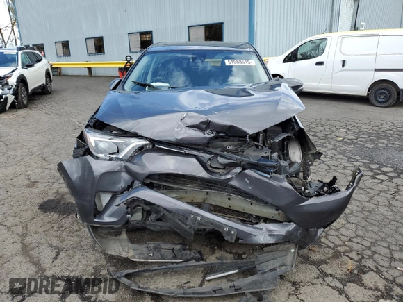 2018 Toyota RAV4 XLE with VIN 2T3RFREV2JW791353, listed as a Copart auction lot 51588515 with 126,830 mi miles and Salvage Title. Bid and sale history available at DreamBid. Image 5.
