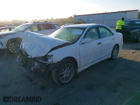 2003 Toyota Camry LE with VIN 4T1BE32KX3U196211, listed as a IAAI auction lot 41535512 with 184,473 mi miles and . Bid and sale history available at DreamBid. Image 2.