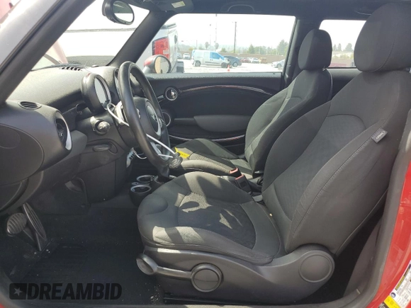 2009 MINI Hardtop S with VIN WMWMF73569TW82889, listed as a Copart auction lot 55630165 with 128,360 mi miles and Clean Title. Bid and sale history available at DreamBid. Image 7.