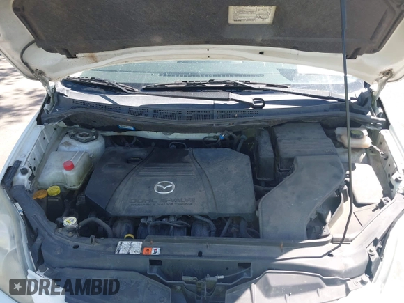 2006 Mazda 5 Touring with VIN JM1CR293060102497, listed as a IAAI auction lot 42544101 with Not provided miles and . Bid and sale history available at DreamBid. Image 10.