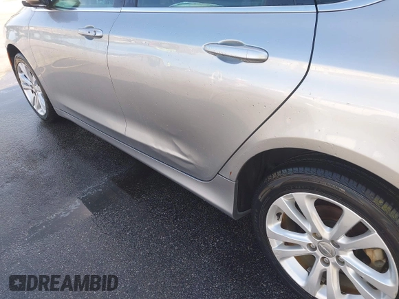 2015 Chrysler 200 Limited with VIN 1C3CCCAB2FN666556, listed as a IAAI auction lot 42056655 with 144,305 mi miles and . Bid and sale history available at DreamBid. Image 6.
