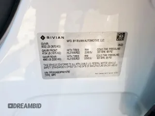 2023 Rivian R1S Launch Edition z VIN 7PDSGABL9PN010792, wystawiony jako Copart lot #56359465 z przebiegiem 24 319 mil mil oraz Szkoda całkowita • Salvage title. Historia ofert i sprzedaży dostępna na DreamBid. Obrazek 14.