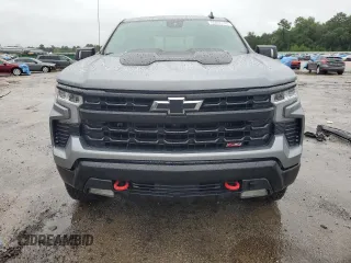 2023 Chevrolet Silverado 1500 LT Trail Boss with VIN 3GCUDFE80PG322764, listed as a Copart auction lot 65935144 with 13,146 mi miles and Salvage Title. Bid and sale history available at DreamBid. Image 5.