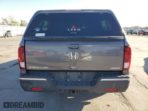 2019 Honda Ridgeline RTL-T with VIN 5FPYK3F67KB027637, listed as a Copart auction lot 53324325 with 70,801 mi miles and Salvage title. Bid and sale history available at DreamBid. Image 6.