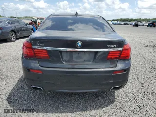 2012 BMW 7 Series 750i xDrive with VIN WBAKC6C5XCC397243, listed as a Copart auction lot 51331165 with 77,424 mi miles and Clean Title. Bid and sale history available at carsss.com. Image 6.