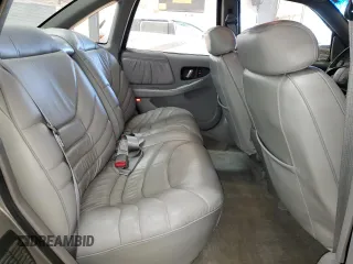 1996 Buick Regal Custom with VIN 2G4WB52KXT1523059, listed as a Copart auction lot 88440285 with 95,444 mi miles and Salvage title. Bid and sale history available at DreamBid. Image 10.