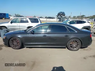 2011 Audi A8 with VIN WAURVAFD9BN014362, listed as a IAAI auction lot 41960366 with 135,244 mi miles and . Bid and sale history available at DreamBid. Image 14.
