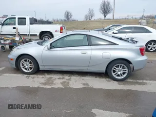 2005 Toyota Celica GT with VIN JTDDR32T950185575, listed as a IAAI auction lot 41710111 with 100,971 mi miles. Bid and sale history available at carsss.com. Image 14.