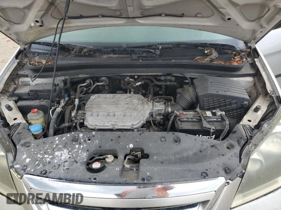 2006 Honda Odyssey LX с VIN 5FNRL38236B043862, выставлен на аукционе Copart как лот 52404045 с пробегом 167 669 миль миль и Списание • Salvage title. История ставок и продаж доступна на DreamBid. Изображение 12.