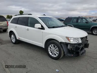 2015 Dodge Journey SXT with VIN 3C4PDCBGXFT743372, listed as a Copart auction lot 65270895 with 119,593 mi miles and Salvage title. Bid and sale history available at DreamBid. Image 4.