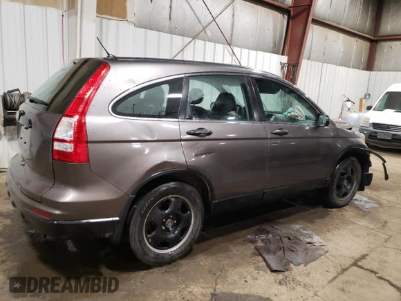 2011 Honda CR-V LX z VIN 3CZRE3H38BG704612, wystawiony jako Copart lot #53729555 z przebiegiem 100 947 mil mil oraz Szkoda całkowita • Salvage title. Historia ofert i sprzedaży dostępna na DreamBid. Obrazek 3.