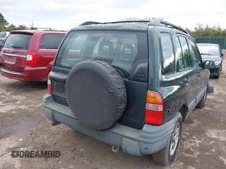 2002 Chevrolet Tracker z VIN 2CNBJ13C126946857, wystawiony jako IAAI lot #41491975 z przebiegiem Nie podano mil oraz . Historia ofert i sprzedaży dostępna na DreamBid. Obrazek 4.