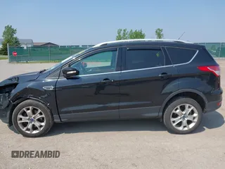 2015 Ford Escape Titanium with VIN 1FMCU9J96FUB58519, listed as a IAAI auction lot 42429369 with 125,541 mi miles and . Bid and sale history available at DreamBid. Image 14.