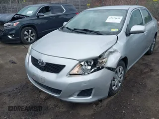 2010 Toyota Corolla with VIN JTDBU4EE6A9115031, listed as a IAAI auction lot 42074142 with 180,225 mi miles. Bid and sale history available at carsss.com. Image 6.