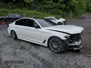 2019 BMW 5 Series M550i xDrive with VIN WBAJB9C54KB288569, listed as a Copart auction lot 58707235 with Not provided miles and Salvage title. Bid and sale history available at DreamBid. Image 4.