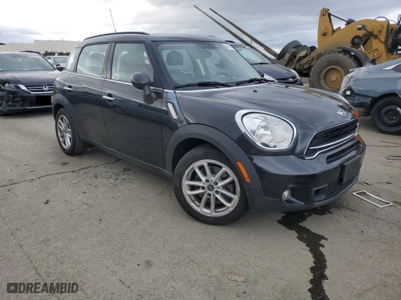 2015 MINI Cooper Countryman S with VIN WMWZC3C5XFWT02471, listed as a Copart auction lot 43716635 with 77,929 mi miles and Salvage Title. Bid and sale history available at carsss.com. Image 4.