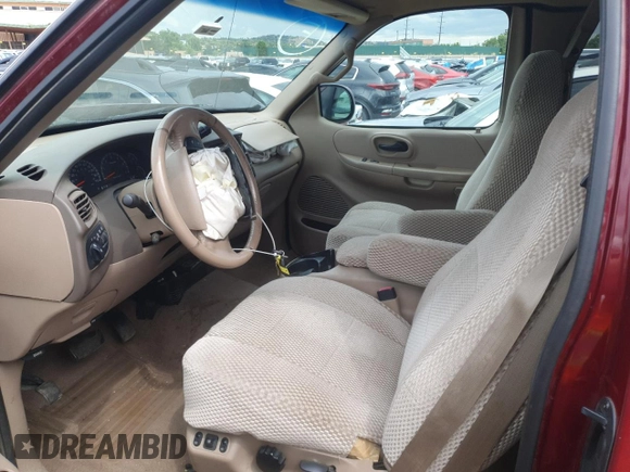1999 Ford F-150 XL z VIN 1FTRX18LXXNB23891, wystawiony jako Copart lot #61445645 z przebiegiem 179 410 mil mil oraz Szkoda całkowita • Salvage title. Historia ofert i sprzedaży dostępna na DreamBid. Obrazek 7.