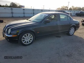 2000 Jaguar S-Type V8 with VIN SAJDA01D5YGL12576, listed as a Copart auction lot 81679383 with 124,354 mi miles and Clean Title. Bid and sale history available at DreamBid. Image 1.