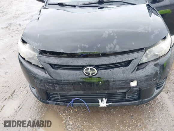 2013 Scion tC with VIN JTKJF5C79D3051664, listed as a IAAI auction lot 42027579 with 211,322 mi miles. Bid and sale history available at carsss.com. Image 6.