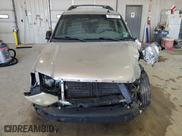 2004 GMC Envoy XL SLE with VIN 1GKET16S146120697, listed as a Copart auction lot 79917634 with 0 mi miles and Salvage Title. Bid and sale history available at carsss.com. Image 5.