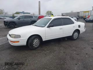 1994 Toyota Camry LE with VIN 4T1SK12E9RU848607, listed as a IAAI auction lot 41972535 with 152,468 mi miles. Bid and sale history available at carsss.com. Image 2.