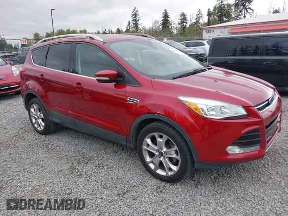 2014 Ford Escape Titanium with VIN 1FMCU9J9XEUD71715, listed as a IAAI auction lot 42127982 with 96,549 mi miles and . Bid and sale history available at DreamBid. Image 1.