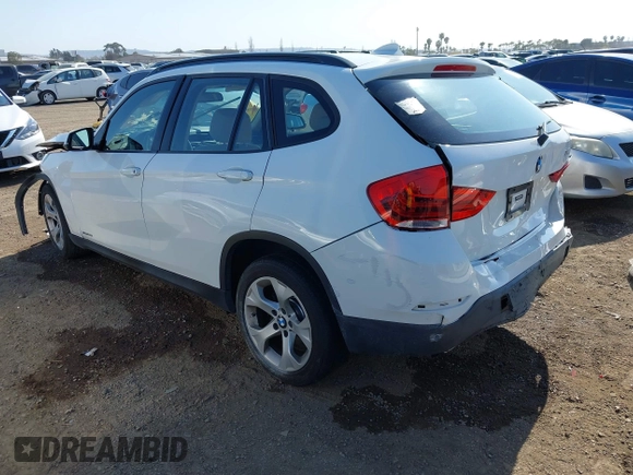 2013 BMW X1 28i with VIN WBAVM1C52DVW45195, listed as a IAAI auction lot 41964903 with 1 mi miles. Bid and sale history available at carsss.com. Image 3.