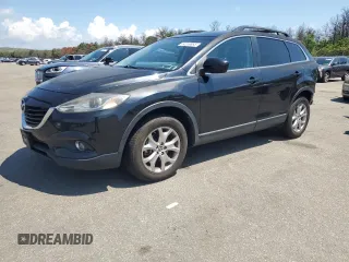 2015 Mazda CX-9 Touring with VIN JM3TB3CV8F0464265, listed as a Copart auction lot 64359885 with 95,980 mi miles and Salvage title. Bid and sale history available at DreamBid. Image 1.