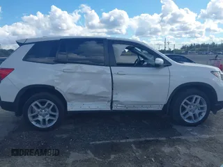 2025 Honda Passport EX-L z VIN 5FNYF8H52SB001266, wystawiony jako IAAI lot #41655256 z przebiegiem 5622 mil mil oraz . Historia ofert i sprzedaży dostępna na DreamBid. Obrazek 13.