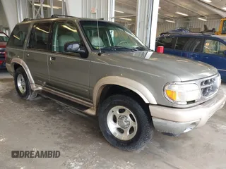 2000 Ford Explorer Eddie Bauer z VIN 1FMZU74E8YZB41346, wystawiony jako IAAI lot #41601042 z przebiegiem 295 103 mil mil oraz . Historia ofert i sprzedaży dostępna na DreamBid. Obrazek 1.